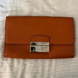 Michael Kors orange clutch